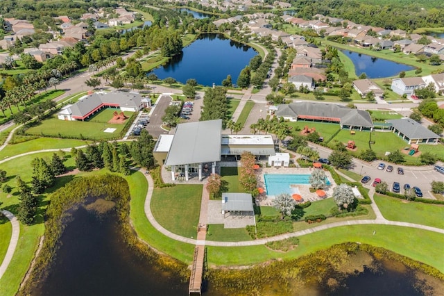 aerial view featuring a residential view and a water view