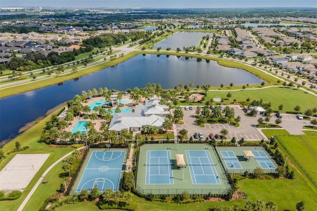 aerial view featuring a residential view and a water view