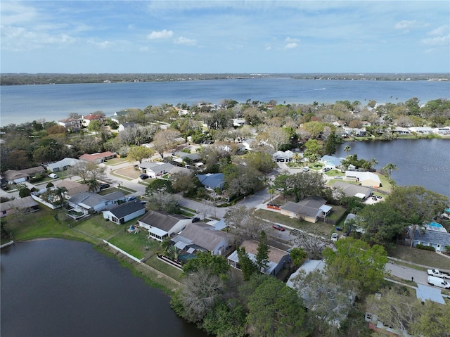 aerial view with a residential view and a water view