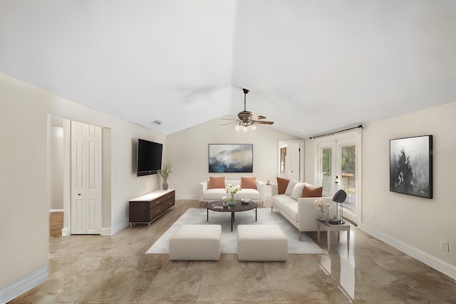 living area featuring lofted ceiling, baseboards, a ceiling fan, and french doors