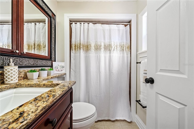 full bath featuring toilet, curtained shower, tile patterned flooring, and vanity