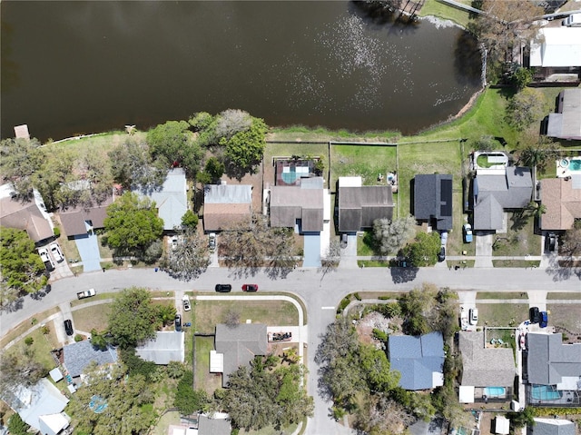 birds eye view of property featuring a residential view and a water view