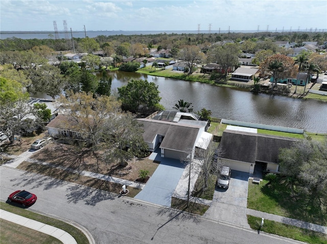 drone / aerial view with a water view