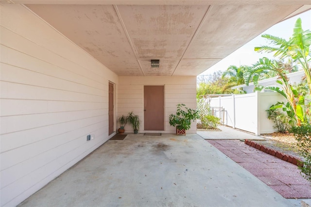 view of patio / terrace featuring fence