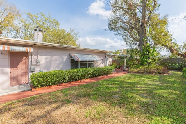 view of yard with fence