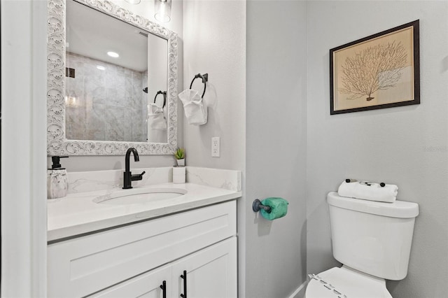 full bathroom featuring toilet and vanity