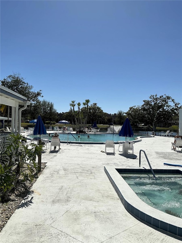 community pool with a patio