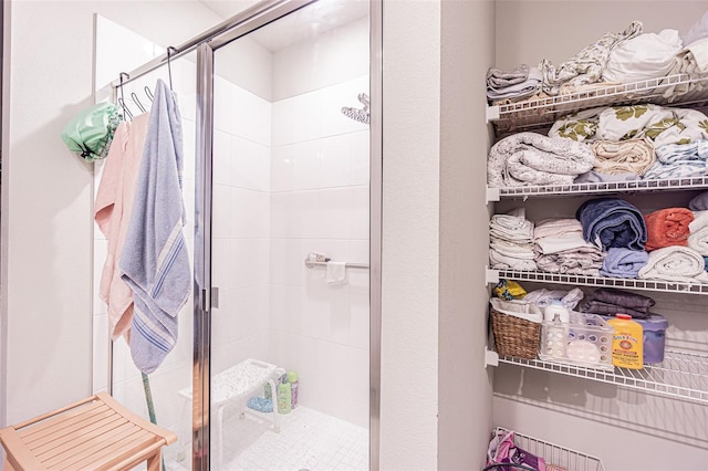 bathroom featuring a stall shower