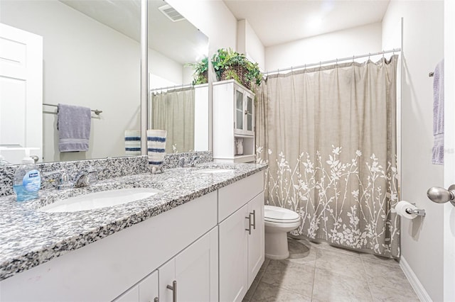 full bath with double vanity, visible vents, toilet, and a sink