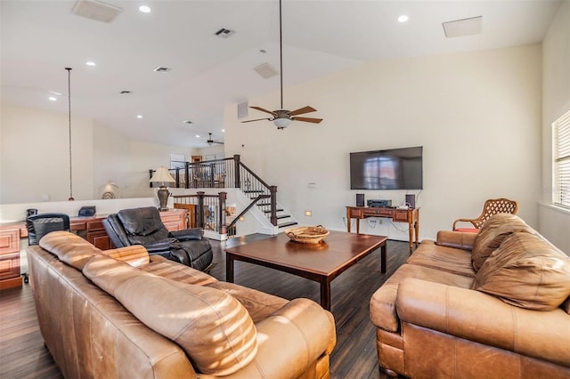 living room with dark wood-style flooring, recessed lighting, visible vents, stairway, and vaulted ceiling