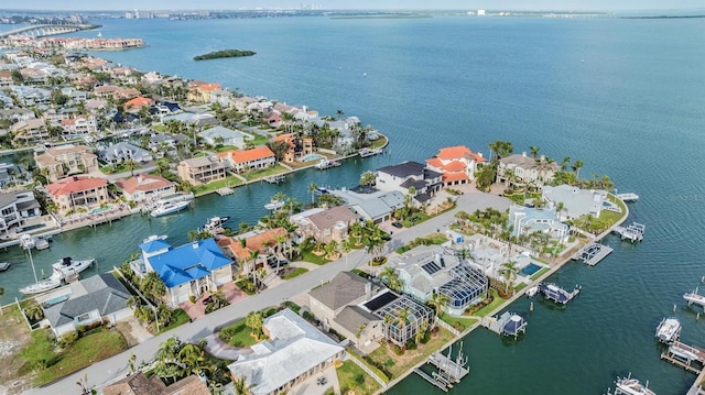 aerial view featuring a residential view and a water view