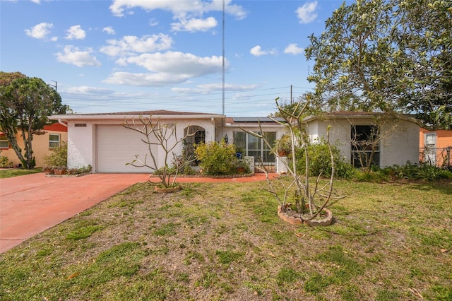 ranch-style house with a front yard, driveway, an attached garage, and stucco siding