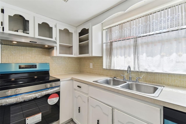 kitchen with under cabinet range hood, a sink, white cabinetry, stainless steel electric range, and decorative backsplash