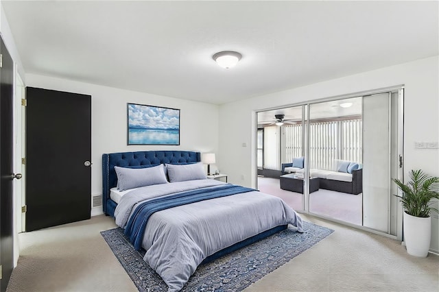 bedroom with light colored carpet