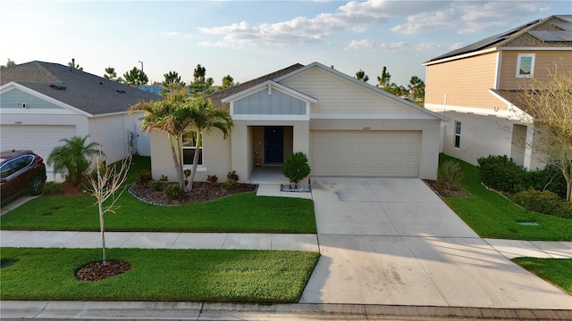 ranch-style home featuring a garage, concrete driveway, and a front yard