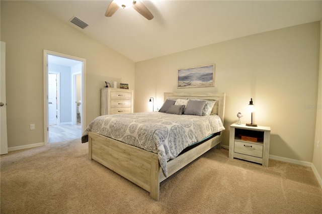 bedroom featuring light colored carpet, visible vents, vaulted ceiling, ceiling fan, and baseboards