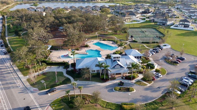 aerial view featuring a water view and a residential view