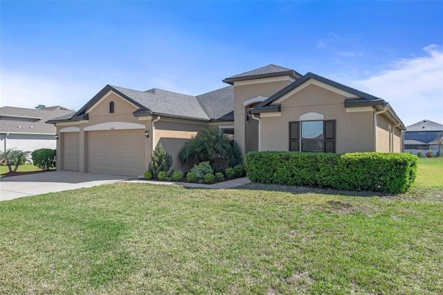 ranch-style house with an attached garage, driveway, a front lawn, and stucco siding