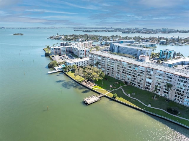 drone / aerial view featuring a water view and a city view