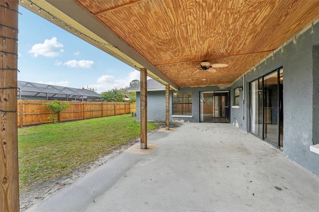 view of patio / terrace featuring a fenced backyard and ceiling fan