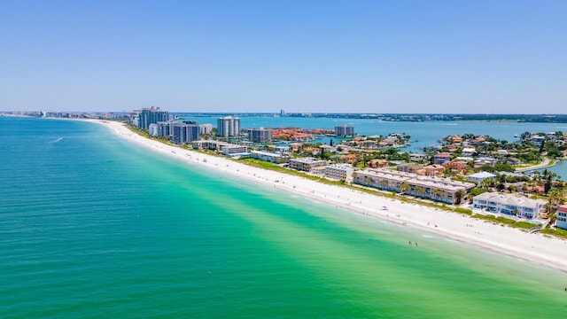 birds eye view of property with a city view, a beach view, and a water view