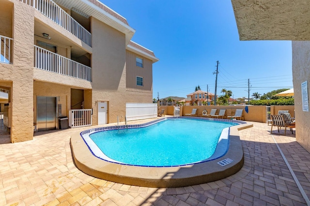 pool featuring a patio