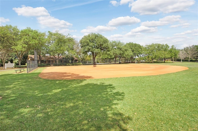 view of home's community with a yard