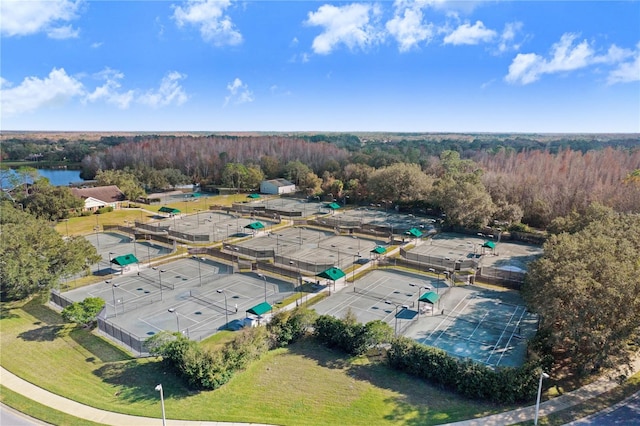 bird's eye view featuring a water view and a view of trees