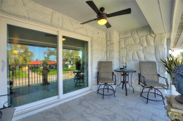 view of patio with a ceiling fan