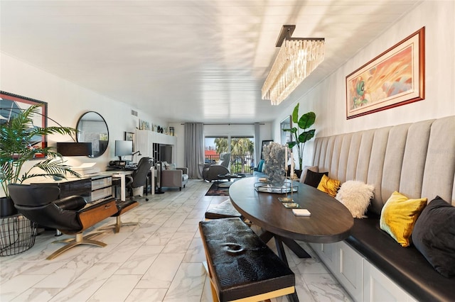 dining room featuring marble finish floor and visible vents