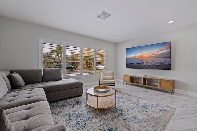 living room with recessed lighting, marble finish floor, visible vents, and baseboards