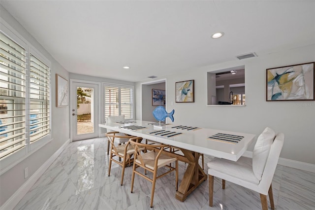 dining area with recessed lighting, visible vents, marble finish floor, and baseboards