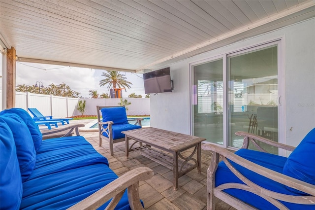 view of patio / terrace featuring a fenced backyard and an outdoor hangout area