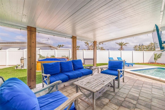 view of patio with outdoor lounge area and a fenced backyard