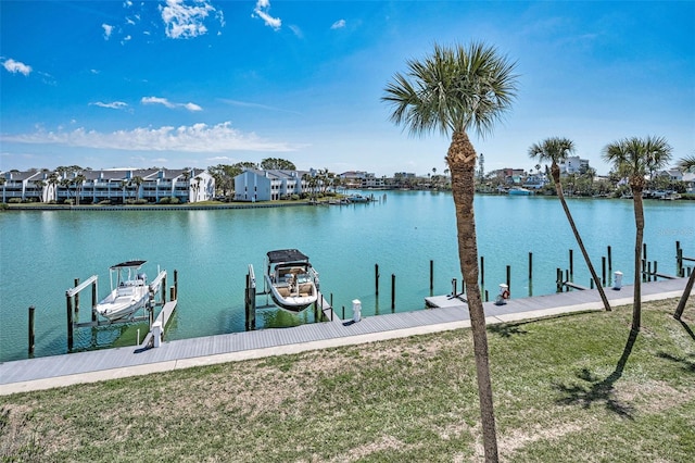 dock area featuring a water view and boat lift