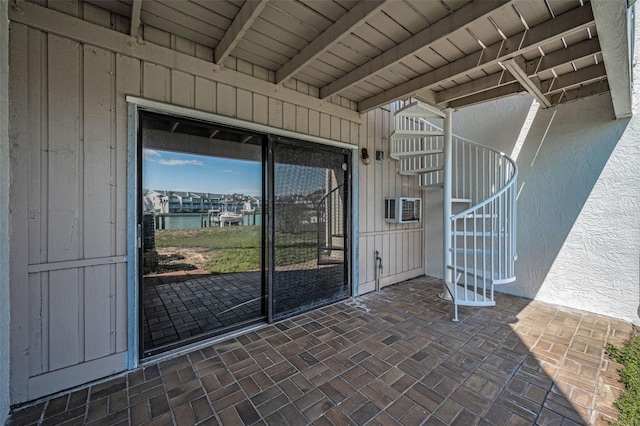 property entrance with a wall mounted air conditioner