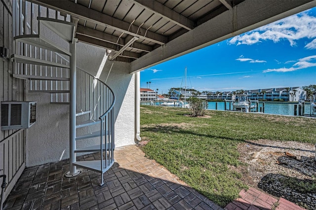 view of patio / terrace with a water view