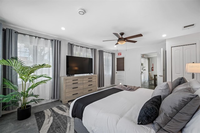 bedroom with a ceiling fan, visible vents, a closet, and recessed lighting