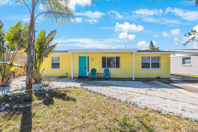 view of front of home with fence