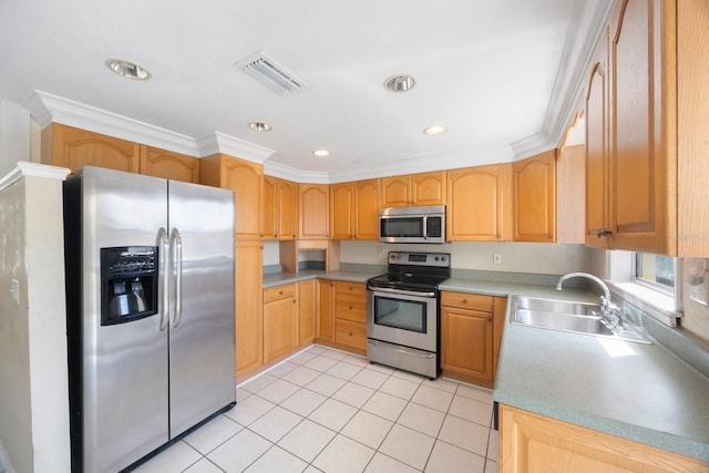 kitchen with light tile patterned floors, a sink, visible vents, light countertops, and appliances with stainless steel finishes