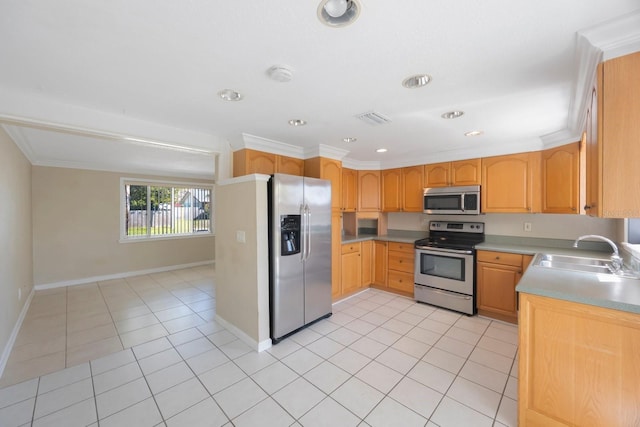 kitchen with light tile patterned floors, visible vents, appliances with stainless steel finishes, light countertops, and a sink