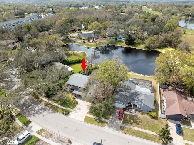 birds eye view of property featuring a water view