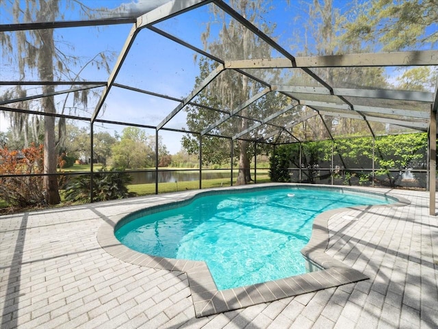 pool with a lanai and a patio