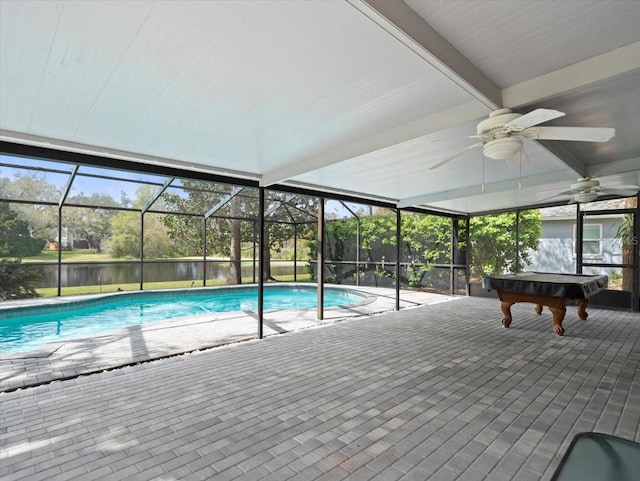 outdoor pool featuring a lanai, ceiling fan, and a patio