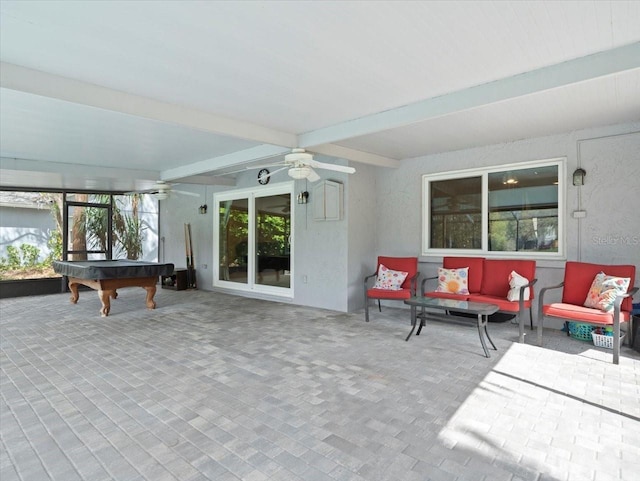 exterior space featuring ceiling fan, beam ceiling, and pool table