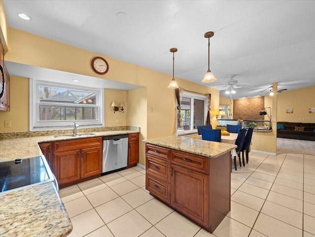 kitchen featuring a sink, light tile patterned floors, brown cabinetry, and stainless steel dishwasher