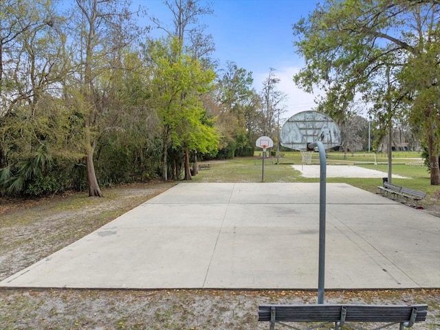 view of sport court with community basketball court and a yard