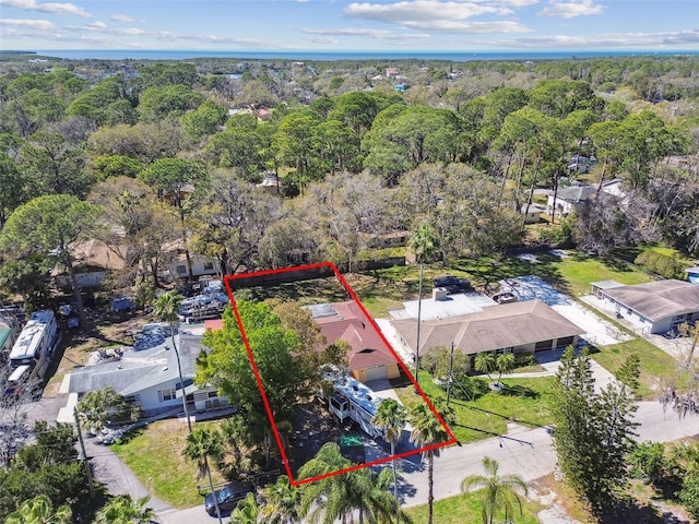 bird's eye view featuring a residential view and a view of trees