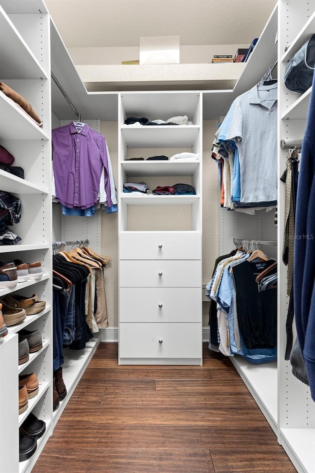 spacious closet with wood finished floors