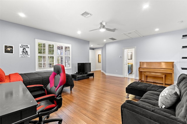 office featuring visible vents, light wood-style flooring, recessed lighting, baseboards, and ceiling fan